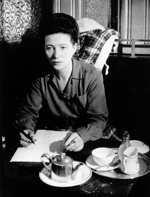 Simone de Beauvoir écrivant au café de Flore (1944, Brassäi)